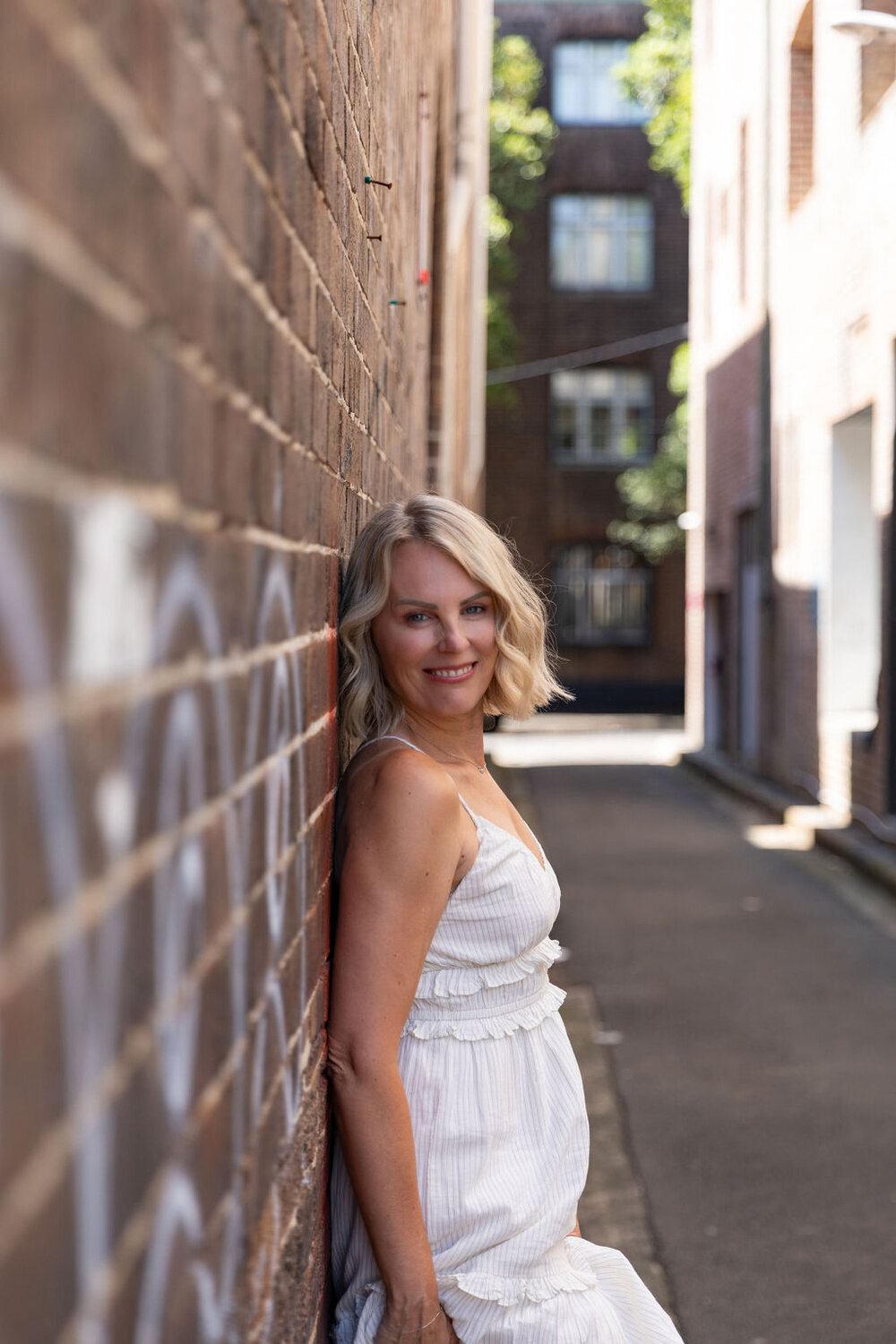 Nerissa Duncan, professional photographer and owner of Nerissa J Photography, in a Sydney laneway
